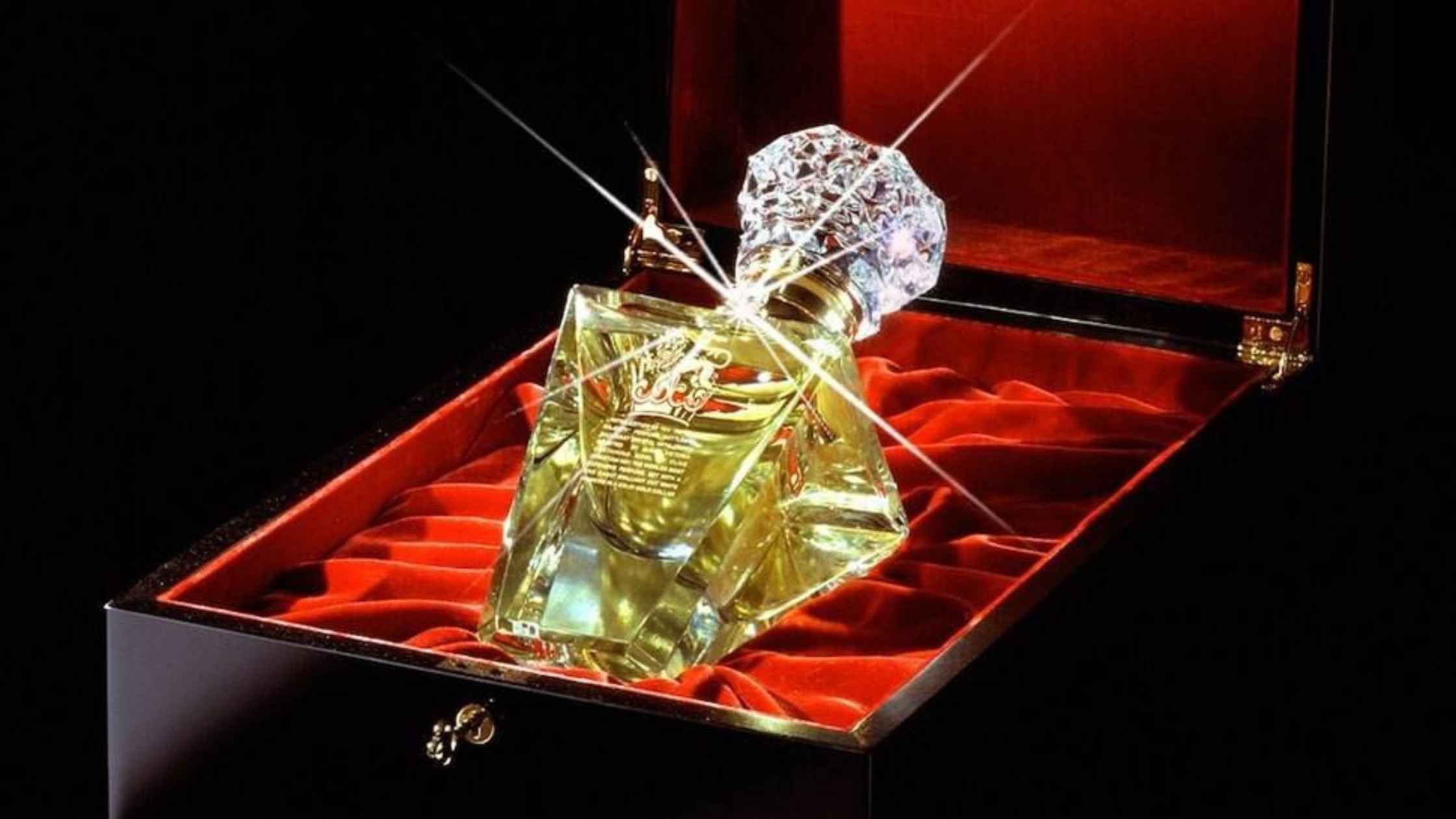 a bottle of perfume in a box